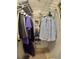 Organized walk-in closet featuring wire shelving and rods for efficient storage at 10177 Mainsail Dr, Oxford, FL 34484