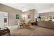 Open-concept living space with comfortable seating and bright natural light at 5449 Dray Dr, The Villages, FL 32163