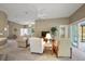 Bright living room with neutral tones and comfortable seating at 5449 Dray Dr, The Villages, FL 32163