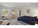 Spacious main bedroom featuring a ceiling fan, and neutral carpeting at 5449 Dray Dr, The Villages, FL 32163