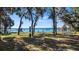 Scenic community waterfront area featuring picnic spots and serene lake views for relaxation at 10301 Us Highway 27 # 16, Clermont, FL 34711