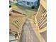 Outdoor deck with stairs leading down to the yard, perfect for enjoying the surrounding scenery at 10301 Us Highway 27 # 16, Clermont, FL 34711