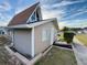 A cozy tan home featuring tidy landscaping and a unique architectural design at 10301 Us Highway 27 # 16, Clermont, FL 34711