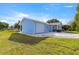 Charming home featuring a screened-in porch and attached garage, set on a well-maintained lawn at 10338 Se 178Th St, Summerfield, FL 34491