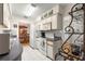 Kitchen showcasing ample counter space, appliances, and open access to the dining room at 10338 Se 178Th St, Summerfield, FL 34491