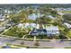 Gorgeous aerial view of the community with a large pond and resort-style pool at 1041 Linehart Dr, Winter Garden, FL 34787