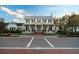 Stately two-story home with a brick-lined walkway and manicured landscaping at 1041 Linehart Dr, Winter Garden, FL 34787