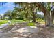 Picturesque park setting featuring lush greenery and shaded seating areas at 1041 Linehart Dr, Winter Garden, FL 34787