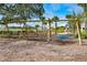 Community playground featuring swings for children and a beautiful, green park at 1041 Linehart Dr, Winter Garden, FL 34787