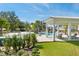 Stunning community pool area with a covered gazebo and plenty of seating at 1041 Linehart Dr, Winter Garden, FL 34787