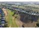 An aerial of the neighborhood is displayed showing the well-manicured lawns at 1067 Mesa Verde Court, Clermont, FL 34711