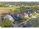 Aerial view of property highlighting the neighborhood and landscaping at 1067 Mesa Verde Court, Clermont, FL 34711