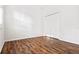 Empty bedroom with wood floor and bright window at 1067 Mesa Verde Court, Clermont, FL 34711