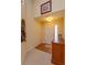 Inviting foyer featuring neutral tones, tile and carpet flooring, and ample natural light at 1123 Bluegrass Dr, Groveland, FL 34736