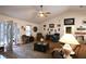 Cozy living room with ceiling fan and a neutral color palette at 1205 Darcy Rd, Lady Lake, FL 32159