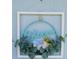 Close-up of a whimsical floral wreath hanging on the front door, enhancing curb appeal at 1846 Fruitland Park Blvd, Fruitland Park, FL 34731