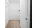 Walk-in closet with rod for hanging garments at 1930 Rhett Rd, The Villages, FL 32163