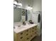 Bathroom featuring double sinks, good lighting, and ample counter space at 22244 County Road 455, Howey In The Hills, FL 34737