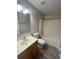 Standard bathroom featuring a shower-tub combination and a single sink vanity at 2320 Whispering Trails Pl, Winter Haven, FL 33884