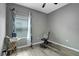 A versatile room featuring luxury vinyl plank flooring and a full-sized window that lets in natural light at 245 Citrus Pointe Dr, Haines City, FL 33844