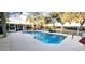 Screened in swimming pool with adjacent outdoor patio at 255 Matisse Ave, The Villages, FL 32162