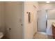 Standard bathroom with a glass-door shower, toilet, and vanity at 2668 Alandari Ln, The Villages, FL 32162