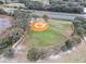 Aerial view of the baseball field, a community amenity offering outdoor recreation and sports activities at 27710 Snow Orchid Ct, Leesburg, FL 34748