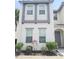 Charming two-story home with modern design, attractive landscaping, and a welcoming front entrance at 294 Captiva Dr, Davenport, FL 33896