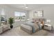 Comfortable bedroom featuring natural light, a ceiling fan, and contemporary decor at 3356 Blaise Ter, The Villages, FL 32163