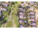 Aerial view of residential neighborhood homes, golf course, and community at 3782 Avon Ct, Clermont, FL 34711