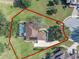 A home on a large lot, enhanced by an outdoor pool at 39131 Griffin Lndg, Lady Lake, FL 32159