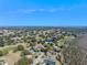 An aerial view of a neighborhood on a golf course at 39131 Griffin Lndg, Lady Lake, FL 32159