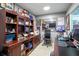 Well appointed office featuring built in wood cabinetry and desk space at 415 Carman Dr, Leesburg, FL 34748