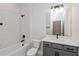 Modern bathroom with white subway tile, sleek vanity, and updated fixtures at 5097 Grand Teton Ct, Deland, FL 32724