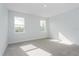 Bright bedroom with two windows at 5097 Grand Teton Ct, Deland, FL 32724