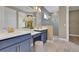 Contemporary bathroom with double sinks, shower and gray tiled floors at 5306 Marshelder St, Apopka, FL 32712