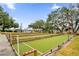 Well-maintained bocce ball court with pristine green surface and ample space for players at 5428 Tangelo St, Leesburg, FL 34748