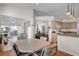 Bright dining area open to kitchen and living area at 5428 Tangelo St, Leesburg, FL 34748