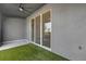 View of a covered patio featuring a fan, and an open view of the backyard at 5435 Dragonfly Dr, Wildwood, FL 34785