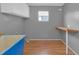 Functional laundry room with a large sink and wooden countertop for folding and cleaning at 730 Royal Palm Ave, The Villages, FL 32159