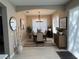 Cozy dining room with modern decor, a stylish light fixture, and lots of natural light at 8004 Saint Andrews Way, Mount Dora, FL 32757