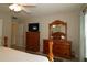 Bedroom featuring matching dressers and a TV on top of a dresser at 8660 Se 132Nd Ln, Summerfield, FL 34491