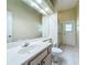 This bathroom includes a vanity, toilet, and shower at 100 Grand Reserve Dr, Davenport, FL 33837