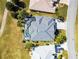 An aerial view of a backyard pool and the home's roof at 1044 Alcove Loop, The Villages, FL 32162