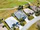 Aerial view of home and golf course community at 1044 Alcove Loop, The Villages, FL 32162