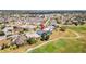 Scenic aerial view of home in golf course community at 1044 Alcove Loop, The Villages, FL 32162