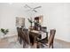 This dining room has a modern ceiling fan and plenty of space for entertaining at 1044 Alcove Loop, The Villages, FL 32162