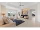 Living room with tile flooring, neutral palette, recessed lighting, and views to other rooms at 1044 Alcove Loop, The Villages, FL 32162