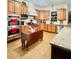 Traditional style kitchen with granite counters, stainless steel appliances and wooden cabinets at 10909 Mattioda Rd, Groveland, FL 34736