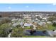 Aerial view highlighting the property's boundaries within a waterfront canal community at 11820 Watts Ct, Tavares, FL 32778